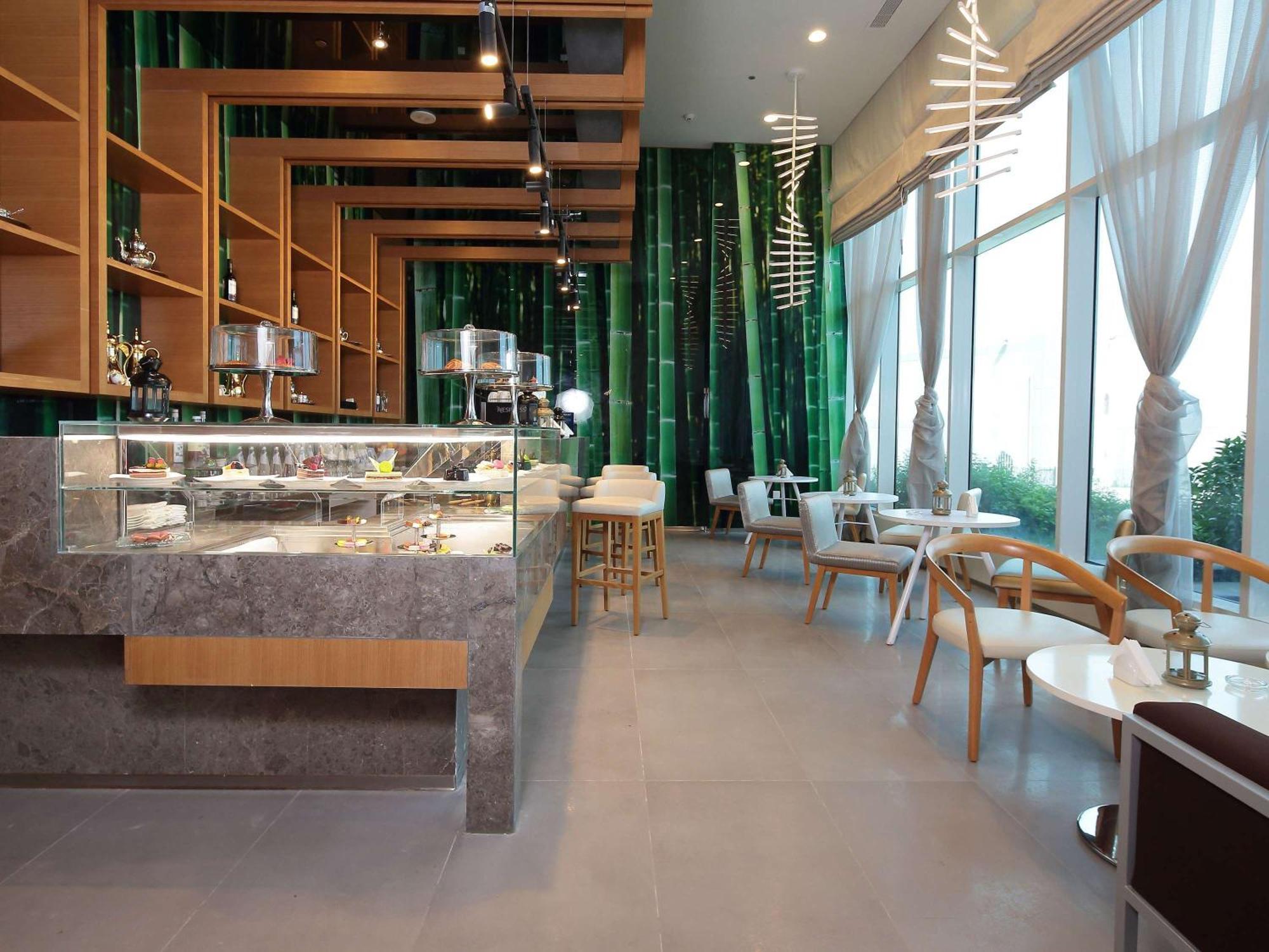 Novotel Jazan Exterior foto The interior of the restaurant